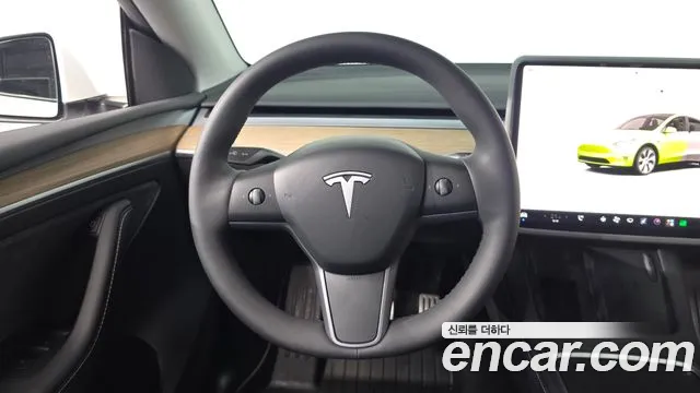 Tesla Model Y — Фото автомобиля 19