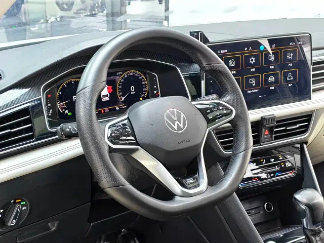 Volkswagen Tiguan L — Фото автомобиля 12