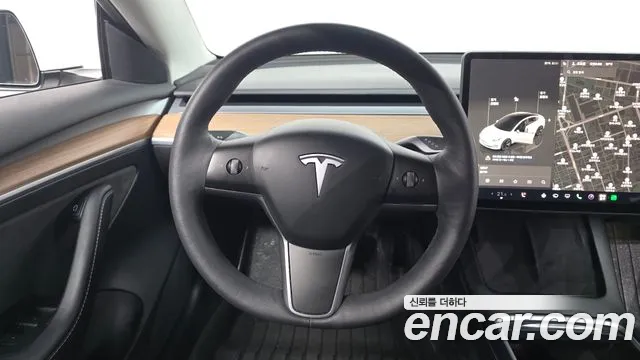 Tesla Model 3 — Фото автомобиля 13