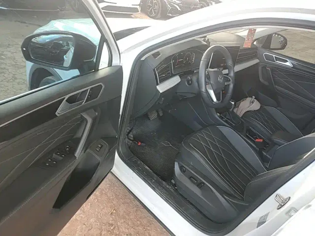 Volkswagen Tiguan L — Фото автомобиля 15