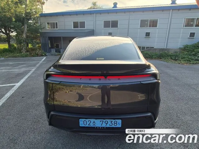 Tesla Model Y — Фото автомобиля 4