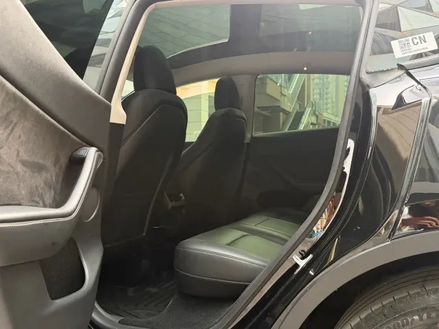 Tesla Model Y — Фото автомобиля 7