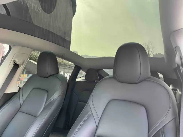Tesla Model Y — Фото автомобиля 14