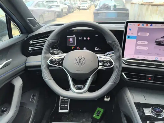 Volkswagen Tiguan L — Фото автомобиля 10