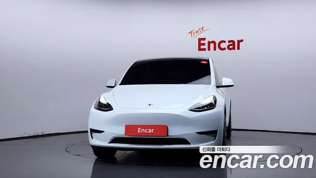 Tesla Model Y — Фото автомобиля 3