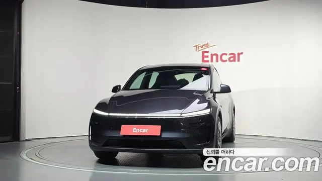 Tesla Model Y — Фото автомобиля 3