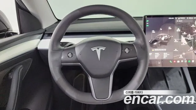 Tesla Model Y — Фото автомобиля 18