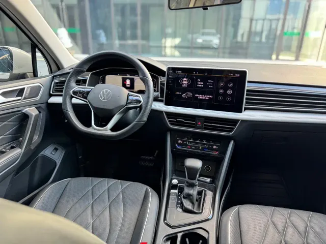 Volkswagen Tiguan L — Фото автомобиля 13