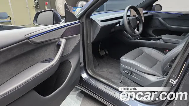 Tesla Model Y — Фото автомобиля 15