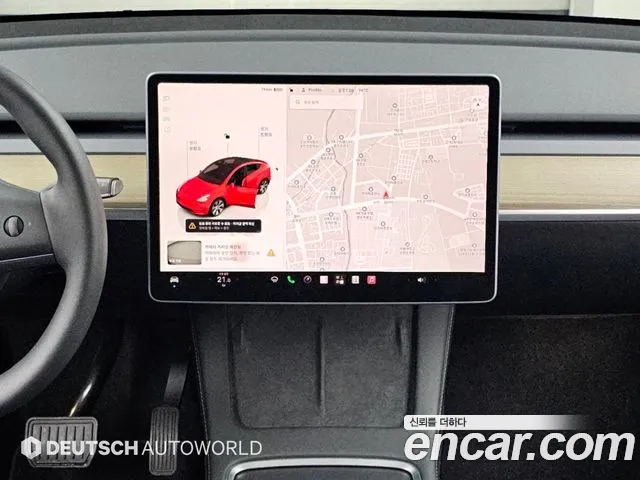 Tesla Model Y — Фото автомобиля 14