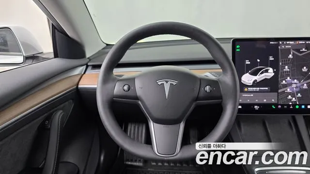 Tesla Model 3 — Фото автомобиля 11