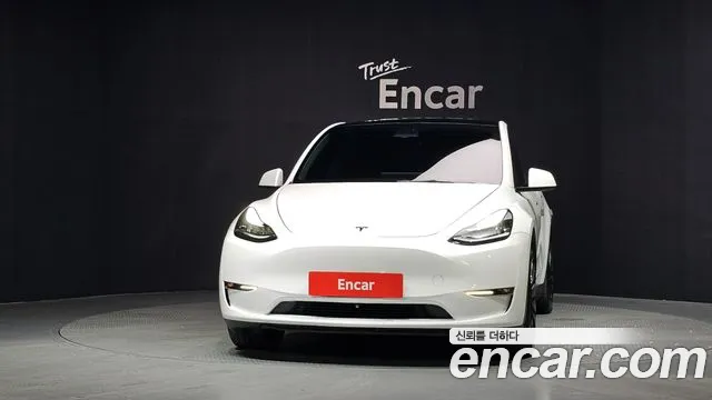 Tesla Model Y — Фото автомобиля 3