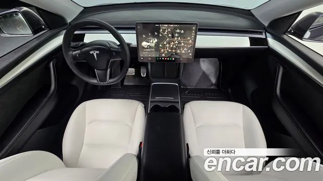 Tesla Model Y — Фото автомобиля 9