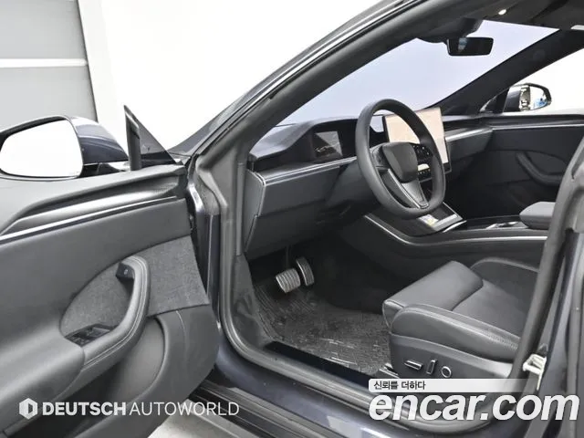 Tesla Model S — Фото автомобиля 11