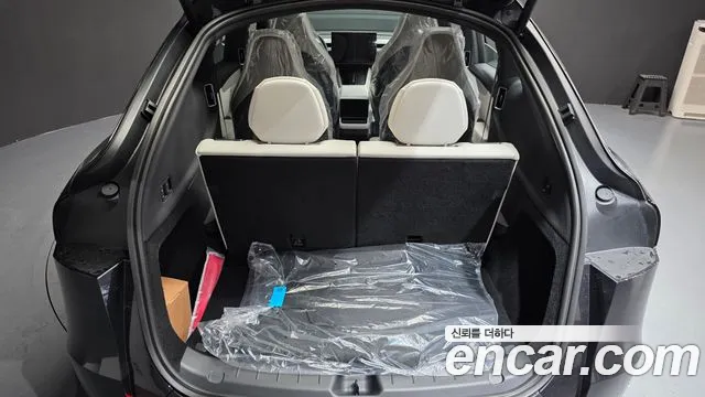 Tesla Model Y — Фото автомобиля 7