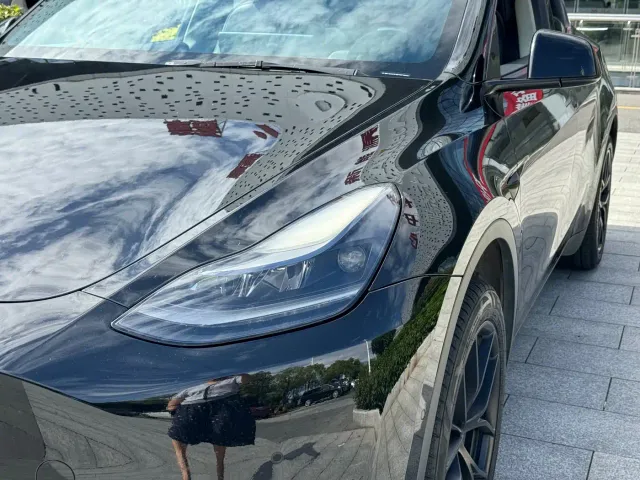 Tesla Model Y — Фото автомобиля 14