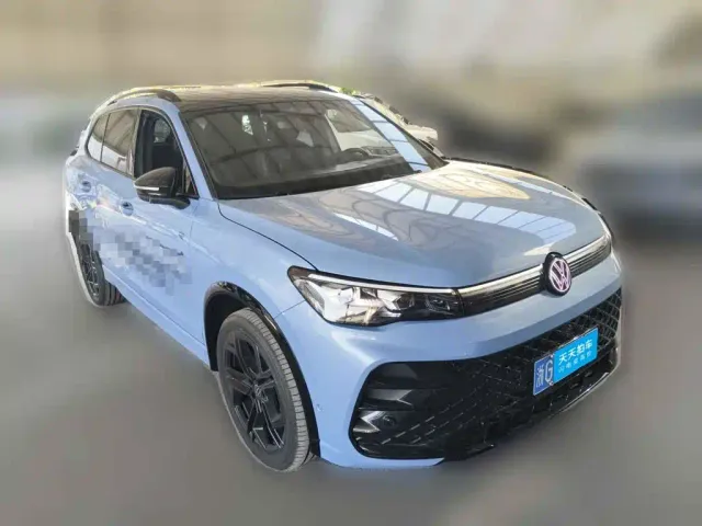 Volkswagen Tiguan L — Фото автомобиля 3