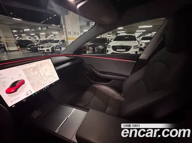 Tesla Model 3 — Фото автомобиля 19