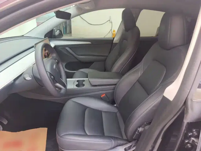 Tesla Model Y — Фото автомобиля 14