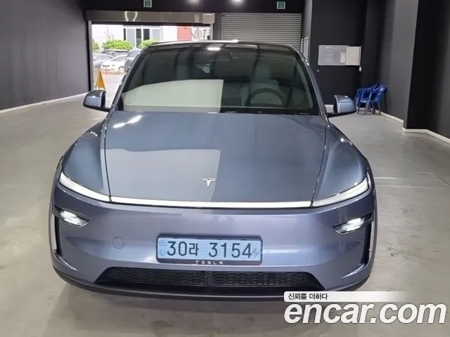 Tesla Model Y — Фото автомобиля 3