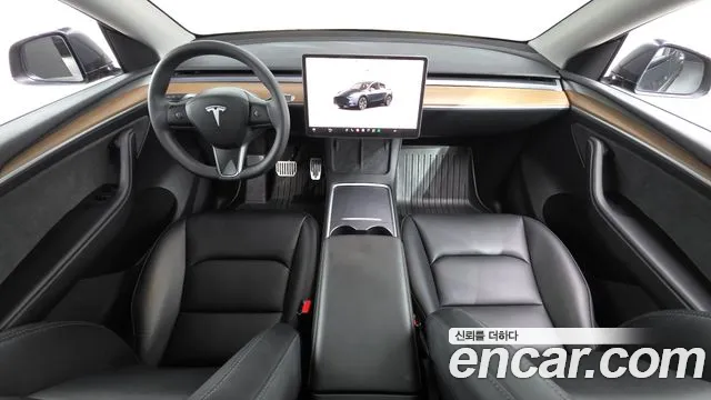 Tesla Model Y — Фото автомобиля 7
