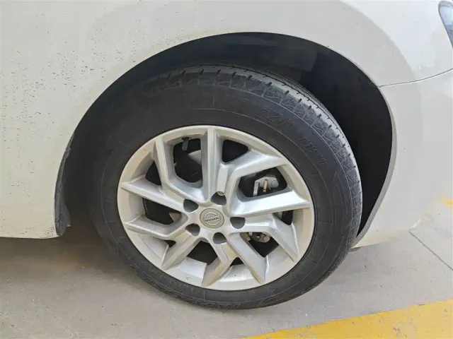 Nissan Tiida — Фото автомобиля 21
