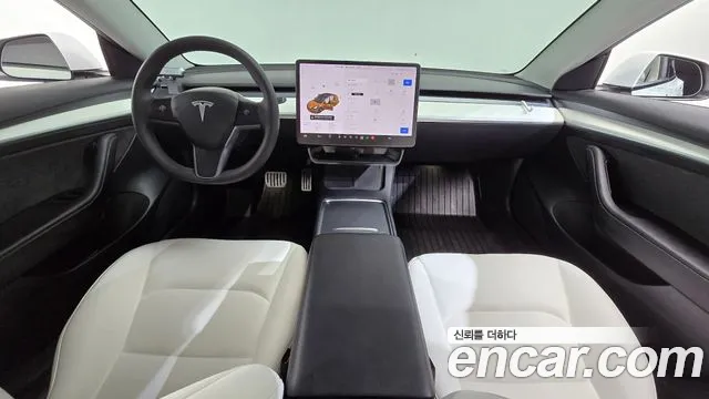 Tesla Model 3 — Фото автомобиля 10