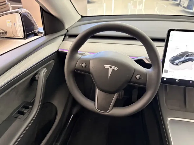 Tesla Model Y — Фото автомобиля 15