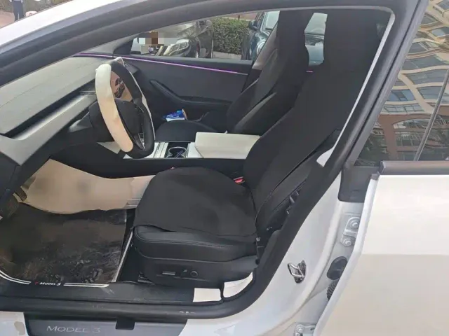 Tesla Model 3 — Фото автомобиля 11