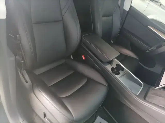 Tesla Model Y — Фото автомобиля 19