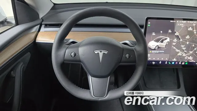 Tesla Model Y — Фото автомобиля 18