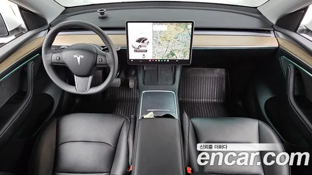 Tesla Model Y — Фото автомобиля 10