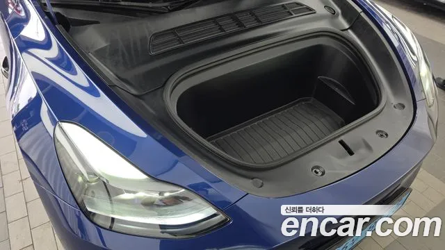 Tesla Model Y — Фото автомобиля 6