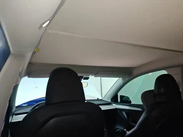 Tesla Model Y — Фото автомобиля 13
