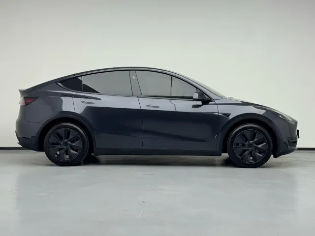 Tesla Model Y — Фото автомобиля 7