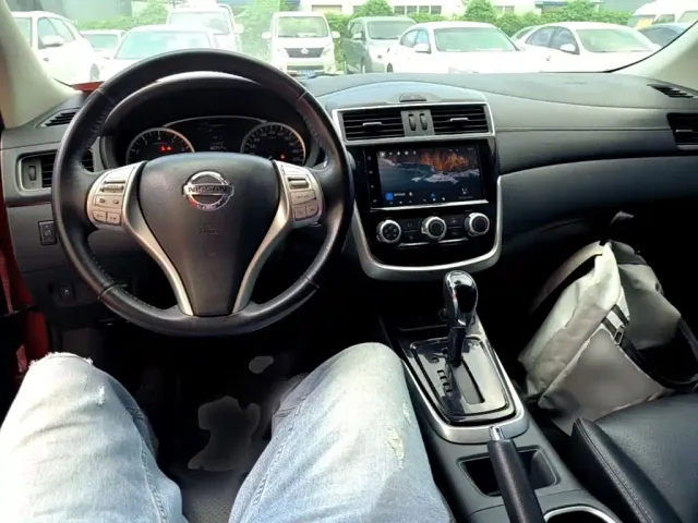 Nissan Tiida — Фото автомобиля 9