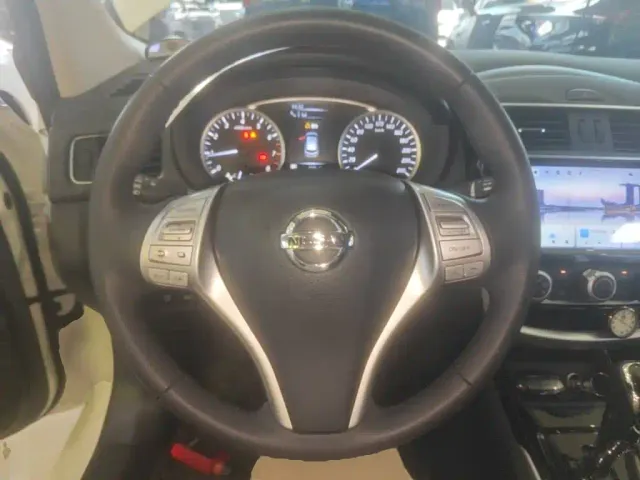 Nissan Tiida — Фото автомобиля 10