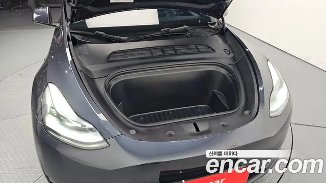 Tesla Model Y — Фото автомобиля 6