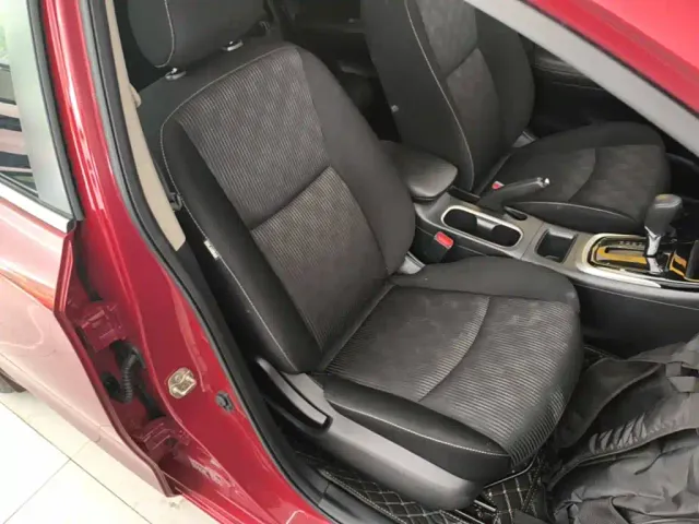 Nissan Tiida — Фото автомобиля 24