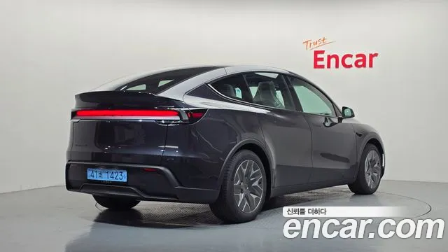 Tesla Model Y — Фото автомобиля 2