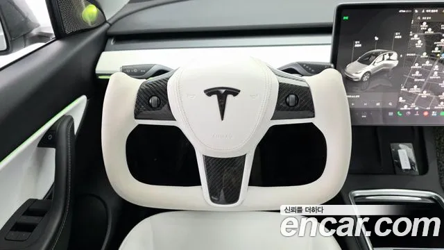 Tesla Model Y — Фото автомобиля 13