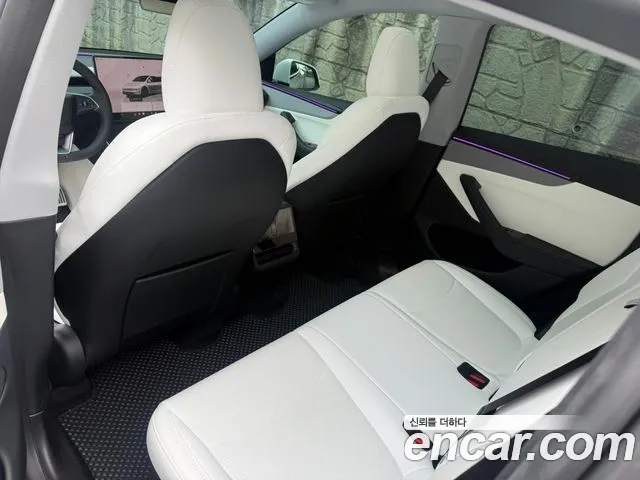 Tesla Model Y — Фото автомобиля 9