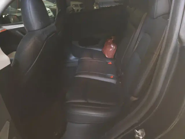 Tesla Model Y — Фото автомобиля 12