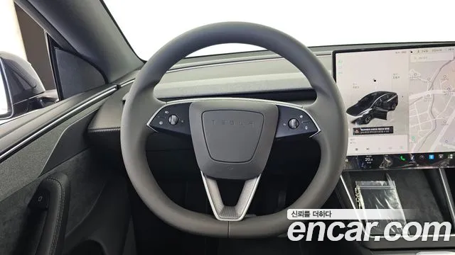 Tesla Model Y — Фото автомобиля 14