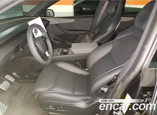 Tesla Model Y — Фото автомобиля 11
