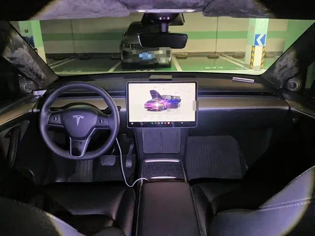 Tesla Model Y — Фото автомобиля 11