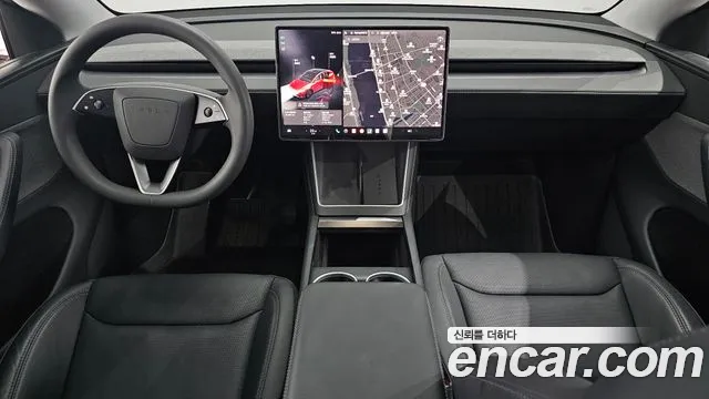 Tesla Model Y — Фото автомобиля 6
