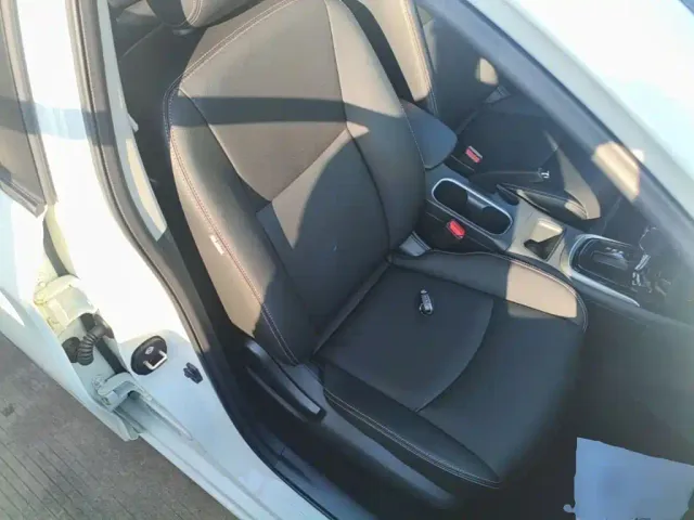 Nissan Tiida — Фото автомобиля 24