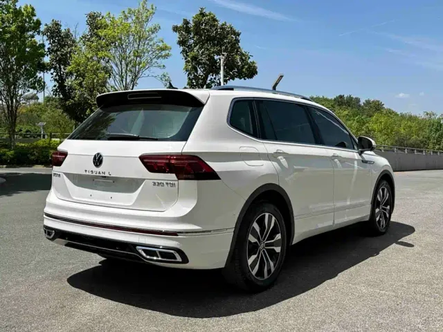 Volkswagen Tiguan L — Фото автомобиля 12