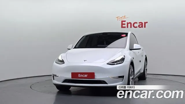 Tesla Model Y — Фото автомобиля 3